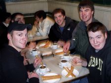 students eating churros in Madrid.JPG
